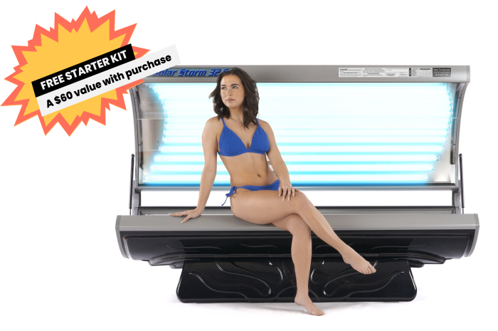 Solar Storm 32s Tanning Bed with 32 lamps opened with model seated